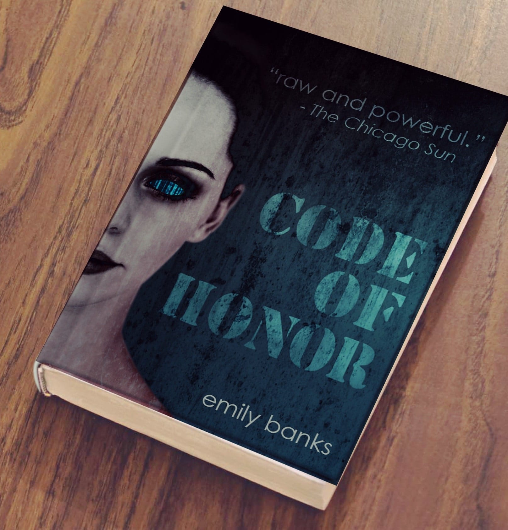 Book cover with a girl's face on it. The background is a blue grungey texture and her visible eye has no white or iris, only a glowing blue barcode.