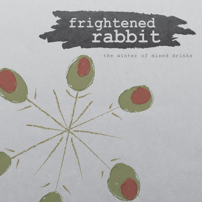 An illustrated CD cover displaying a series of toothpicks with olives on them, arranged in the shape of a snowflake. The title "The Winter of Mixed Drinks" is written on the muted grey background.